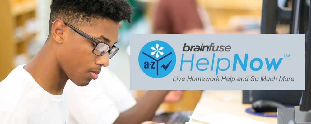 A Black teenage boy wearing glasses sits at a computer. Brainfuse Help Now logo, Live Homework Help and so much more!