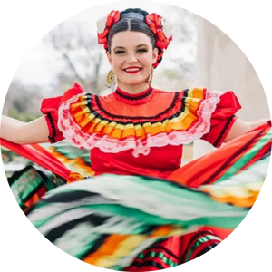 A woman dances in a traditional Mexican dress of red and green
